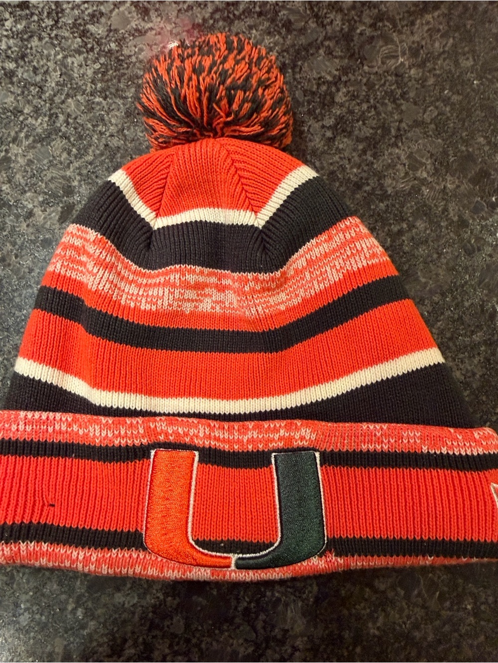 University of Miami Orange green striped beanie with pompom and U Logo